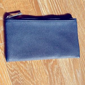 Navy cosmetic bag.